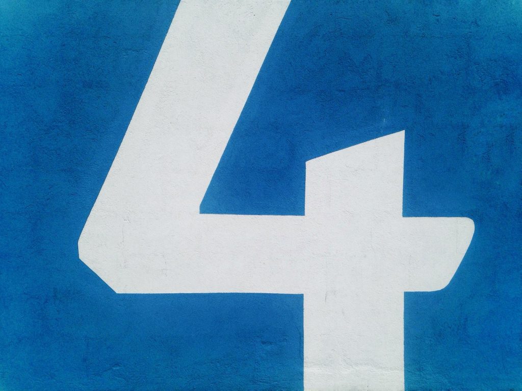 White number four on a blue background